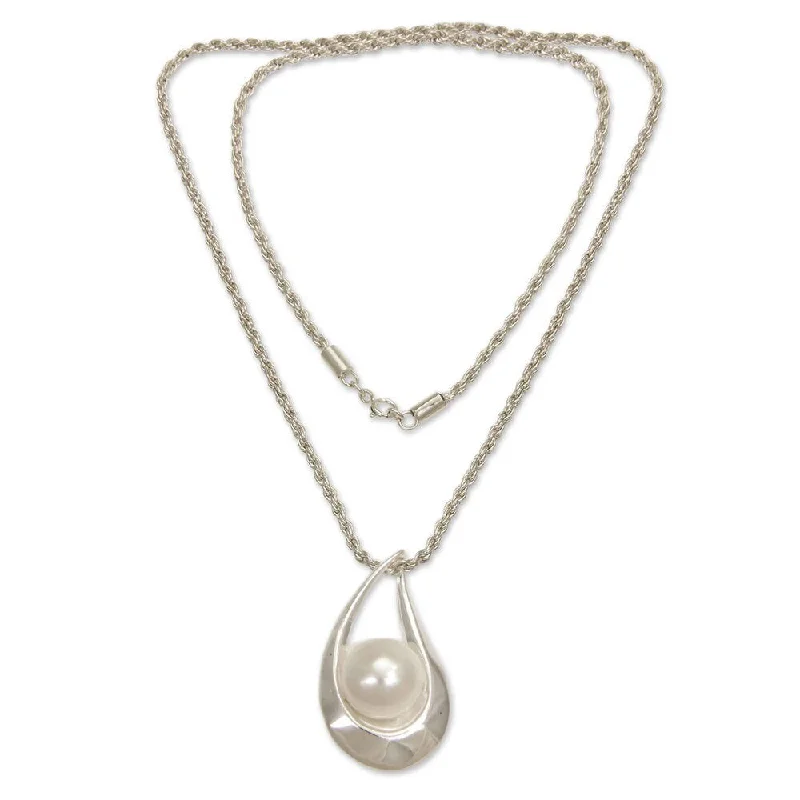 Worn style necklaces-Handmade Pearl Pendant Necklace, 'White Symphony' (Indonesia)